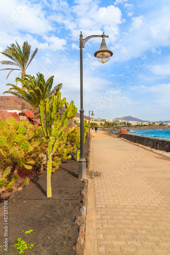 Coastal promenade along ocean in Playa Blanca, Lanzarote, Canary Islands, Spain