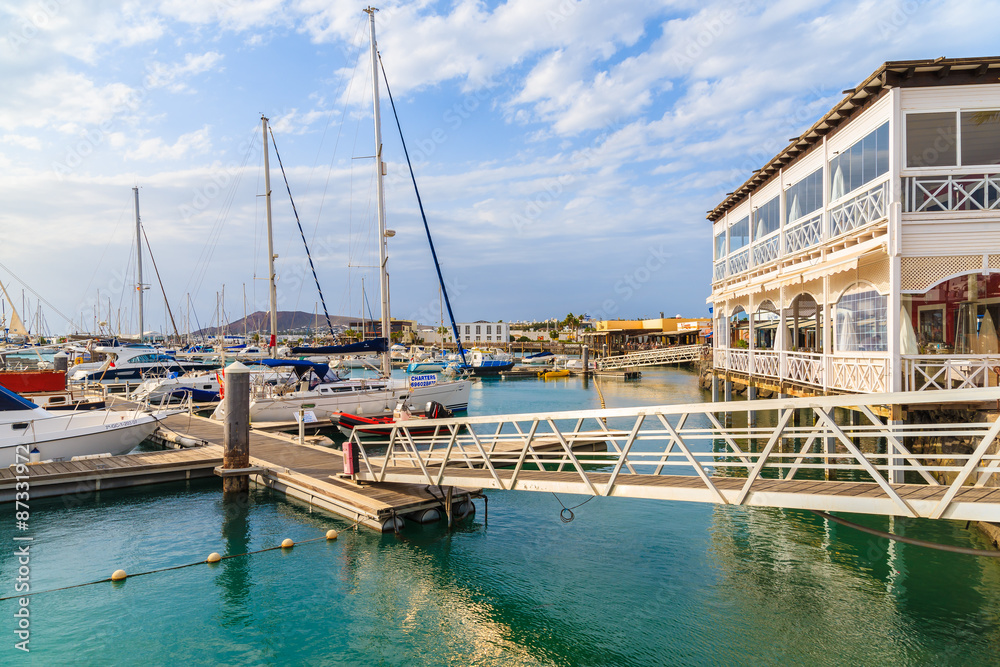 Restaurant and pier in Rubicon port, Playa Blanca town, Lanzarote, Canary Islands, Spain