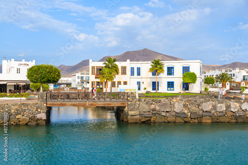 Canarian buildings and footbridge in Rubicon port, Playa Blanca town, Lanzarote, Canary Islands, Spain
