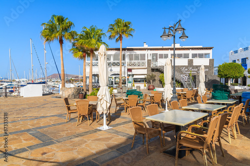 Restaurant tables in Rubicon port  Playa Blanca town  Lanzarote  Canary Islands  Spain