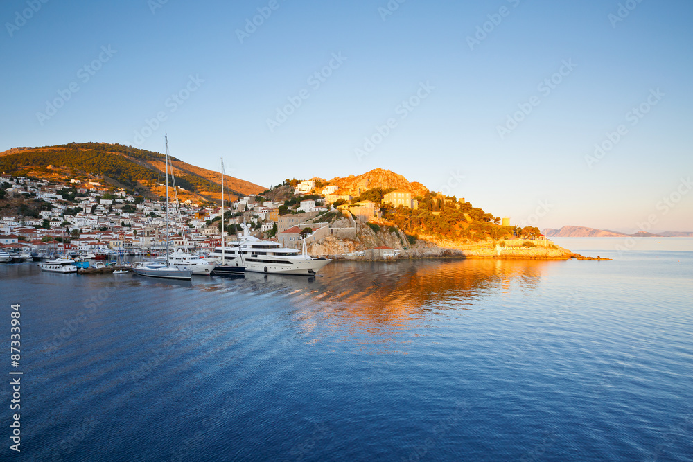 Boats in the harbour of Hydra just after sunrise.