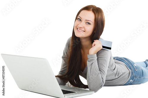 Online Shopping. Happy Smiling Woman Using Credit Card to Intern