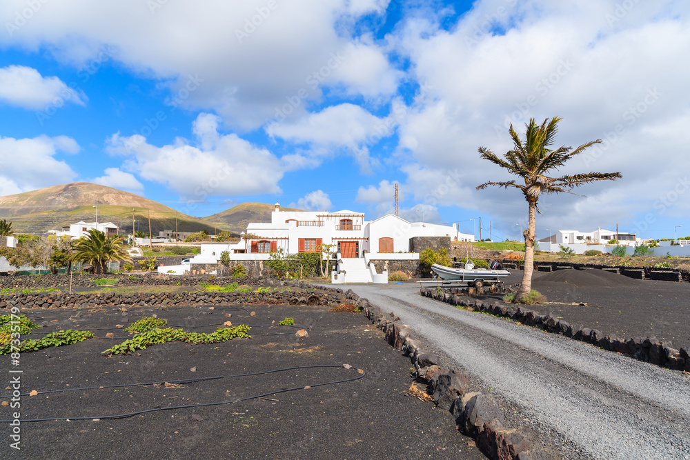 Road to typical Canarian houses near Puerto de la Carmen, Lanzarote, Canary Islands, Spain