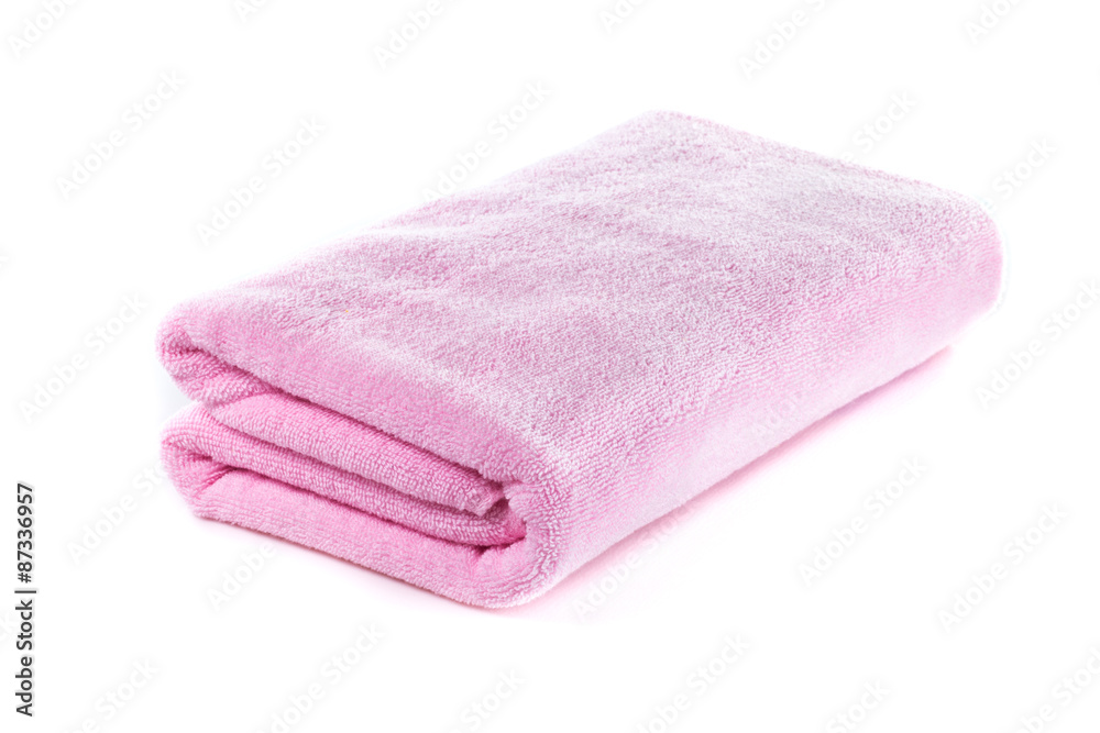 Pink soft bath towel isolated on white background Pink soft bath towel isolated on white background