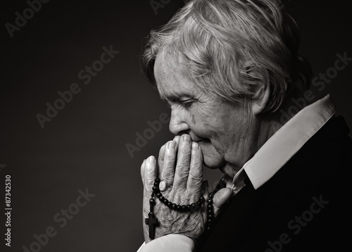 Φωτογραφία Praying senior woman.