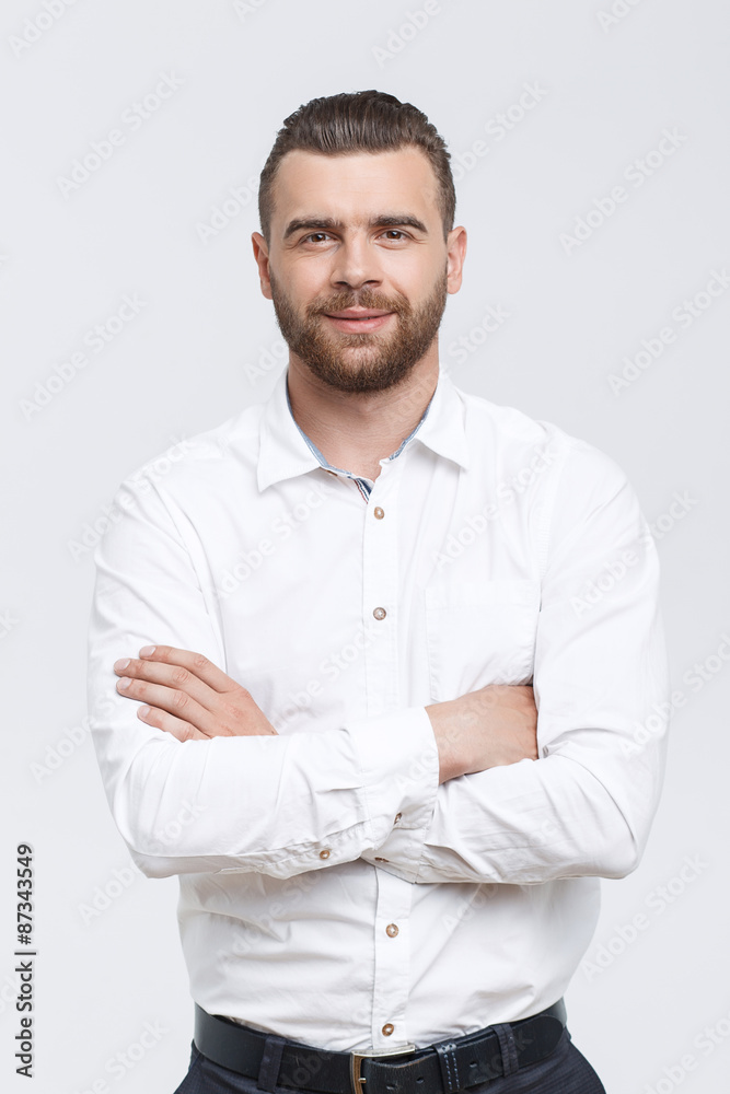 Solid man with crossed arms isolated background Solid man with crossed arms isolated background