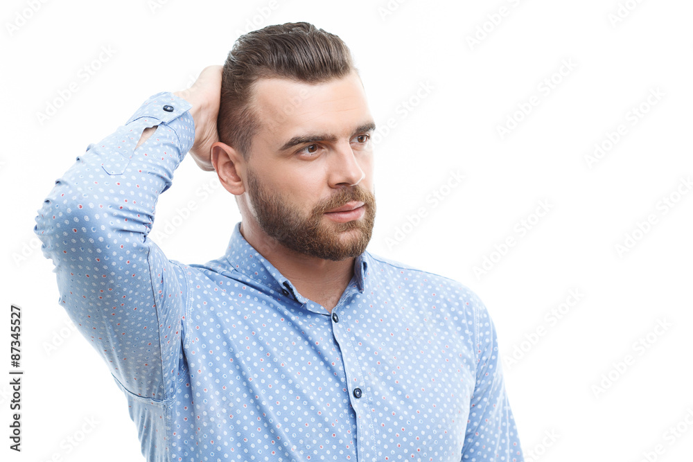 Man touching his head with hand 