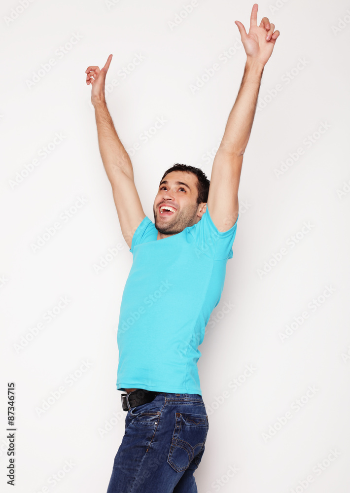 man with both hands raised in the air. man with both hands raised in the air.