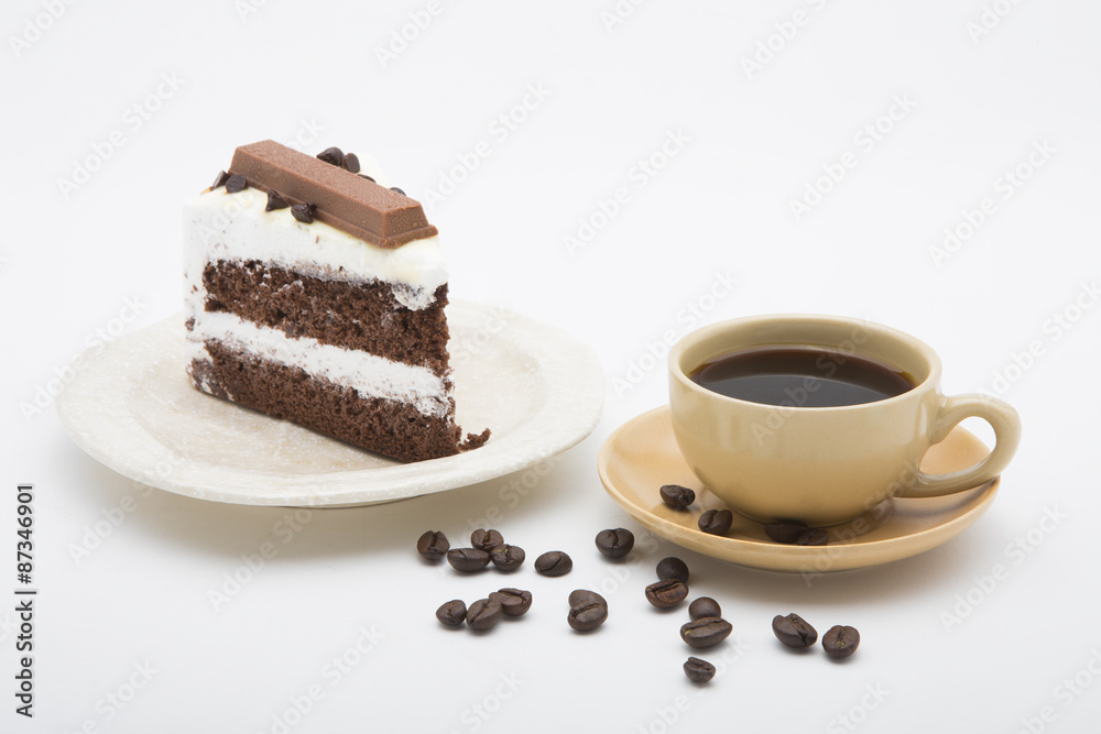 cup of coffee and delicious cake on white background