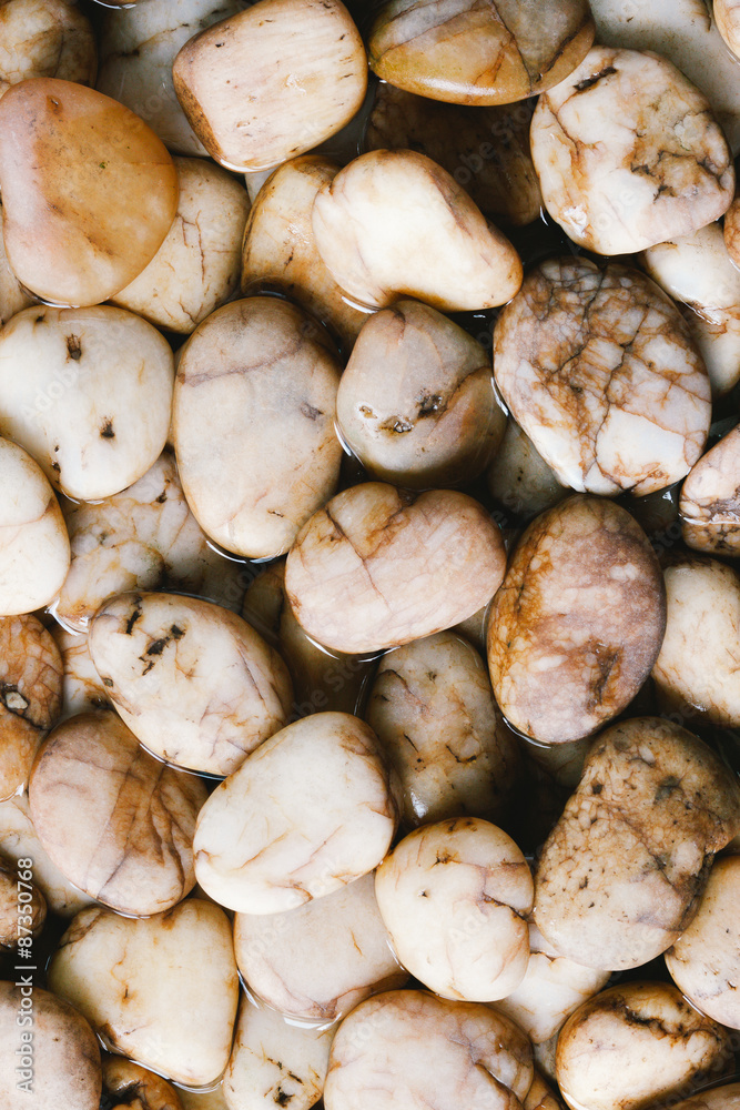 wet river stones background wet river stones background