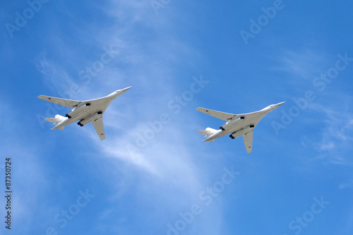 White Swans. Russian military aircraft supersonic bombers with variable sweep wing Tu-160 in flight