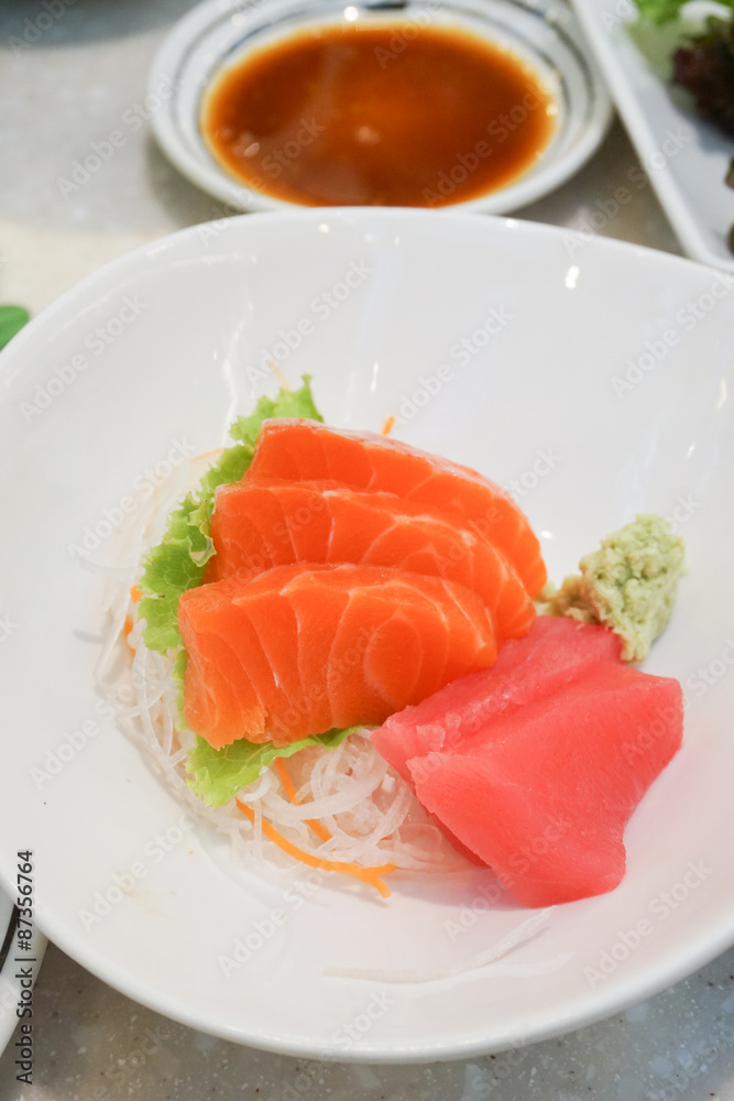 Delicious mixed sashimi on a plate.