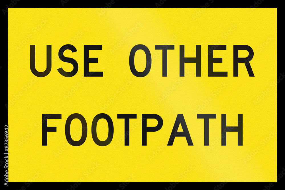 Fototapeta premium An Australian temporary road sign - Pedestrians use other footpath