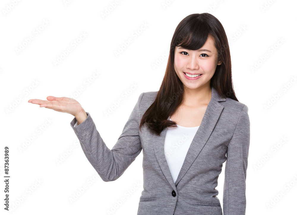 Asian young businesswoman with hand showing blank sign Asian young businesswoman with hand showing blank sign