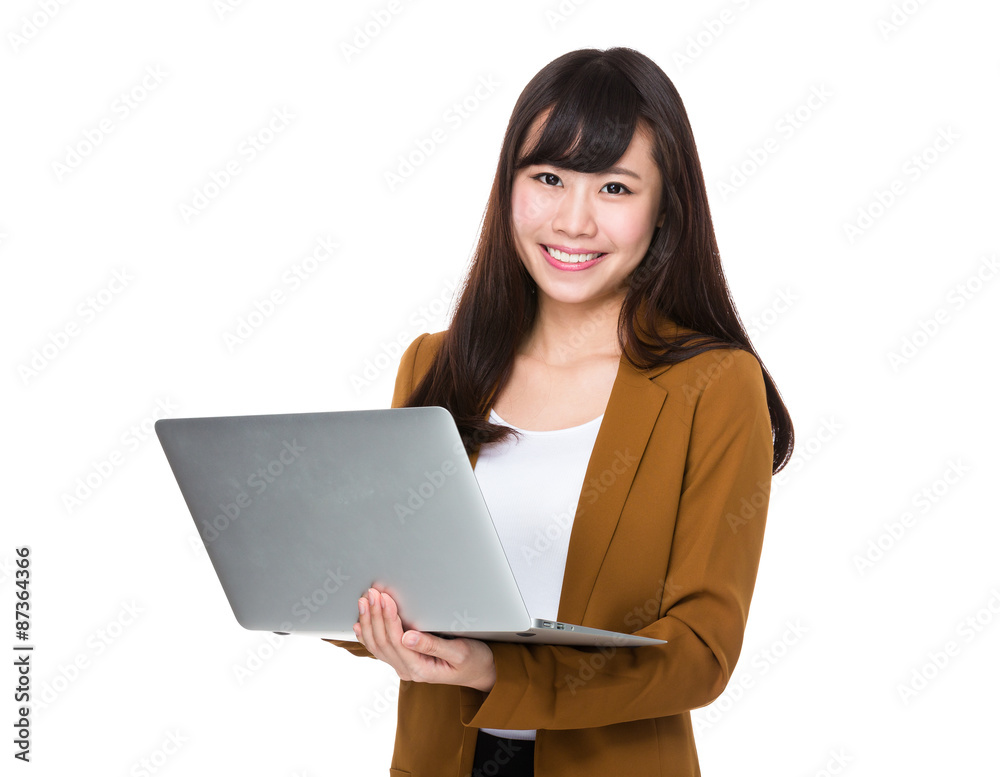 Young businesswoman use of the notebook computer Young businesswoman use of the notebook computer