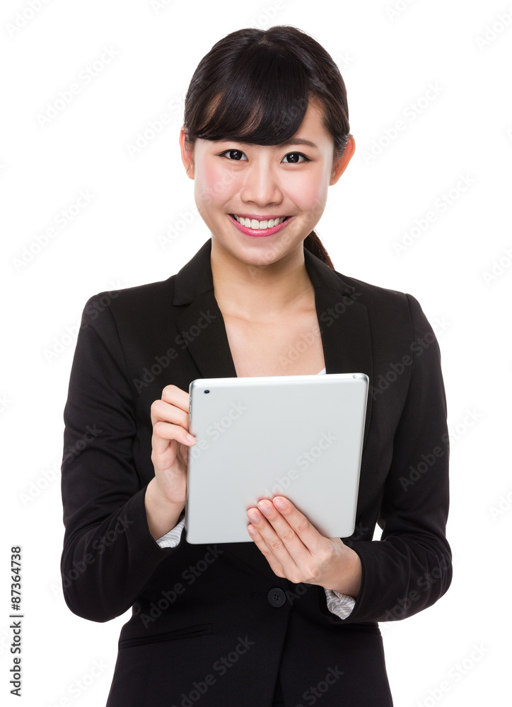 Young businesswoman use of the tablet pc Young businesswoman use of the tablet pc