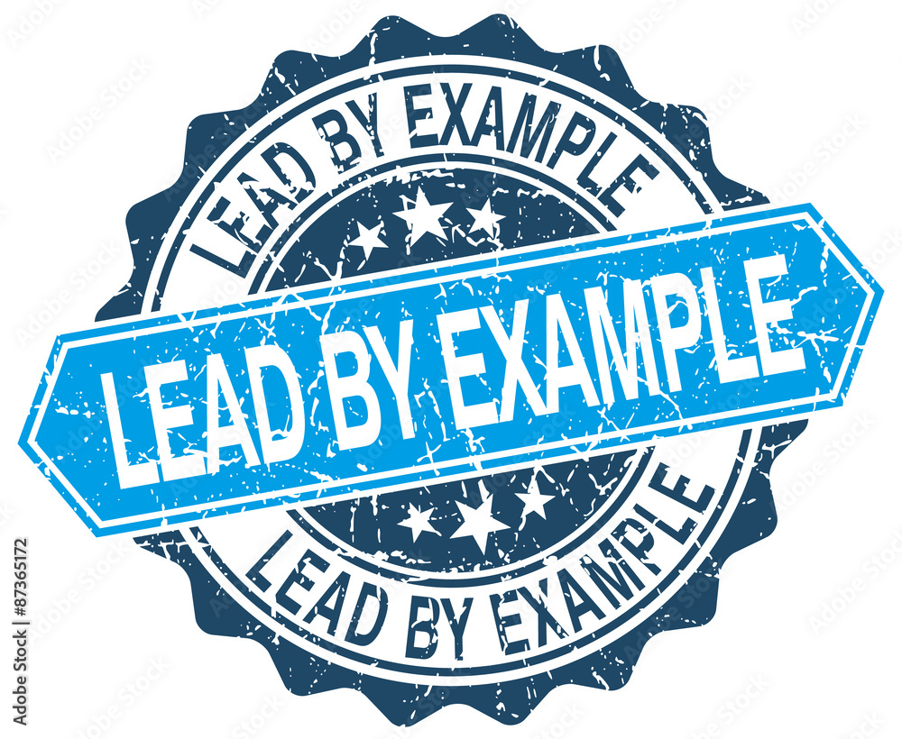 Fototapeta premium lead by example blue round grunge stamp on white