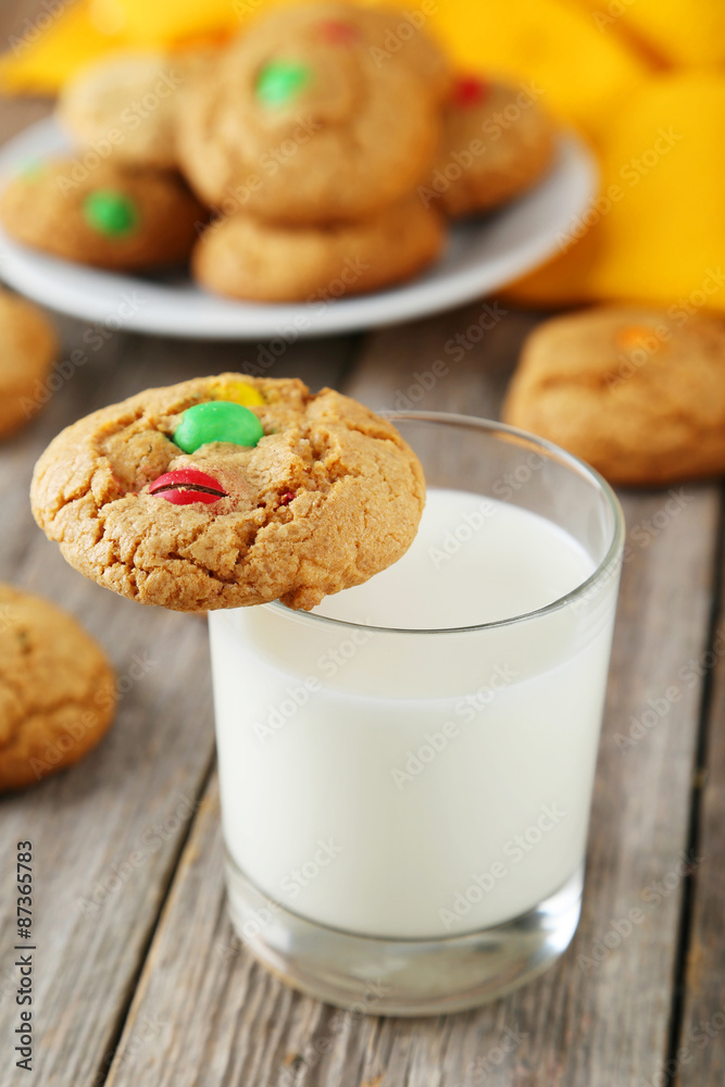Cookies with colorful candy on grey wooden background Cookies with colorful candy on grey wooden background