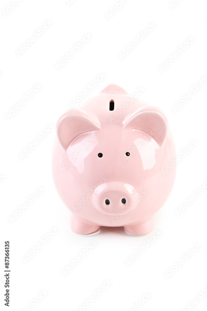 Pink piggy bank isolated on a white
