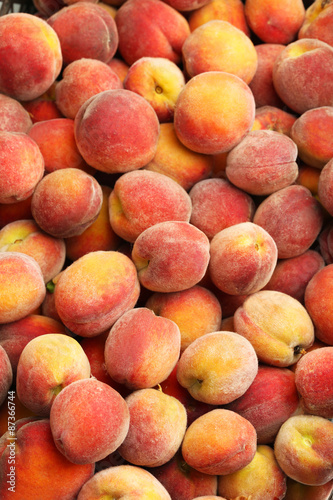 Ripe peach fruit background, close up