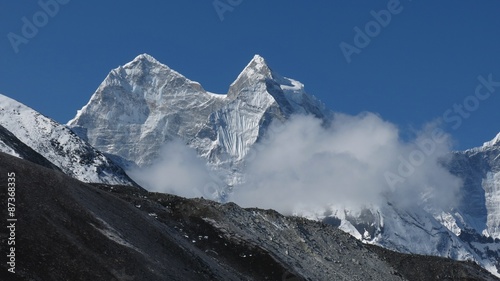 Majestic mountains Kangtega and Thamserku photo