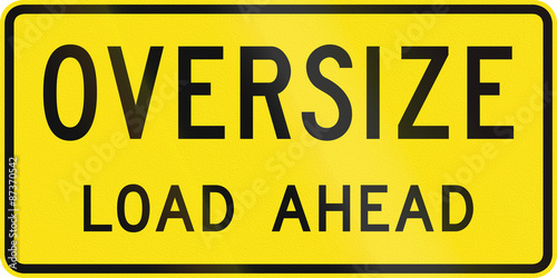 An Australian additional temporary road sign used in Queensland - Oversize load ahead photo