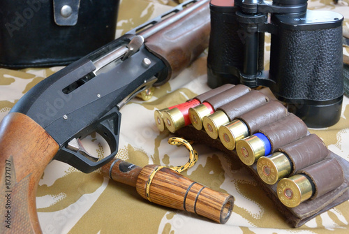 duck call ammo and gun