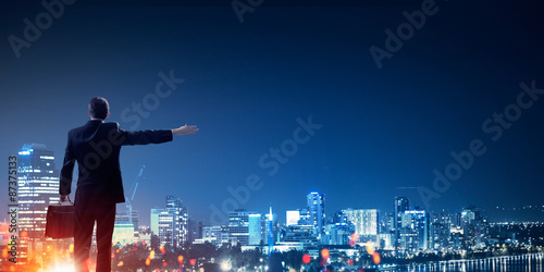 Businessman greeting his city