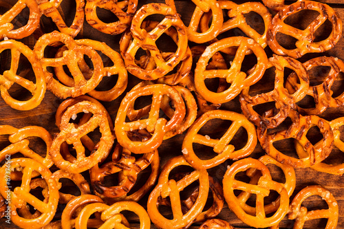 Typical bavarian pretzel on old wooden table
