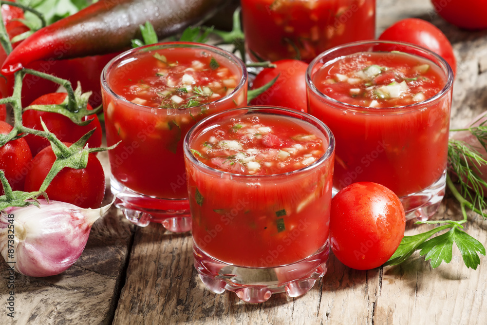 Traditional tomato soup gazpacho in a glass, selective focus Traditional tomato soup gazpacho in a glass, selective focus