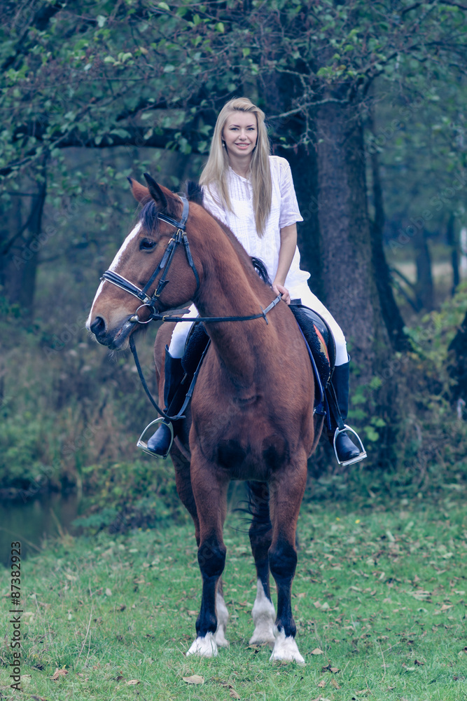 Romantic girl in a white horse. beautiful girl and a horse Romantic girl in a white horse. beautiful girl and a horse