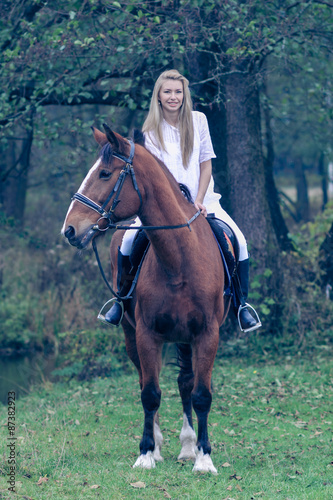 Romantic girl in a white horse. beautiful girl and a horse © ruslimonchyk