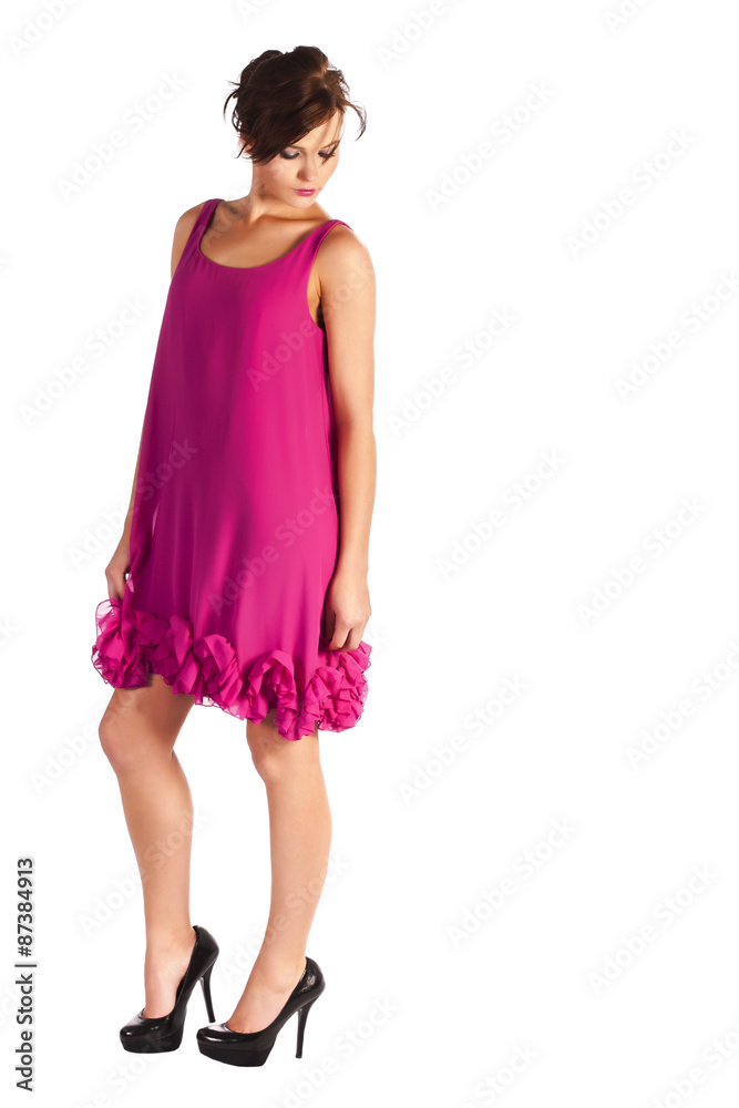 Young and sexy woman model in pink dress posing Young and sexy woman model in pink dress posing