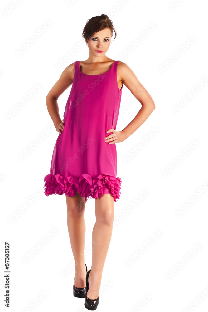 Young and sexy woman model in pink dress posing Young and sexy woman model in pink dress posing