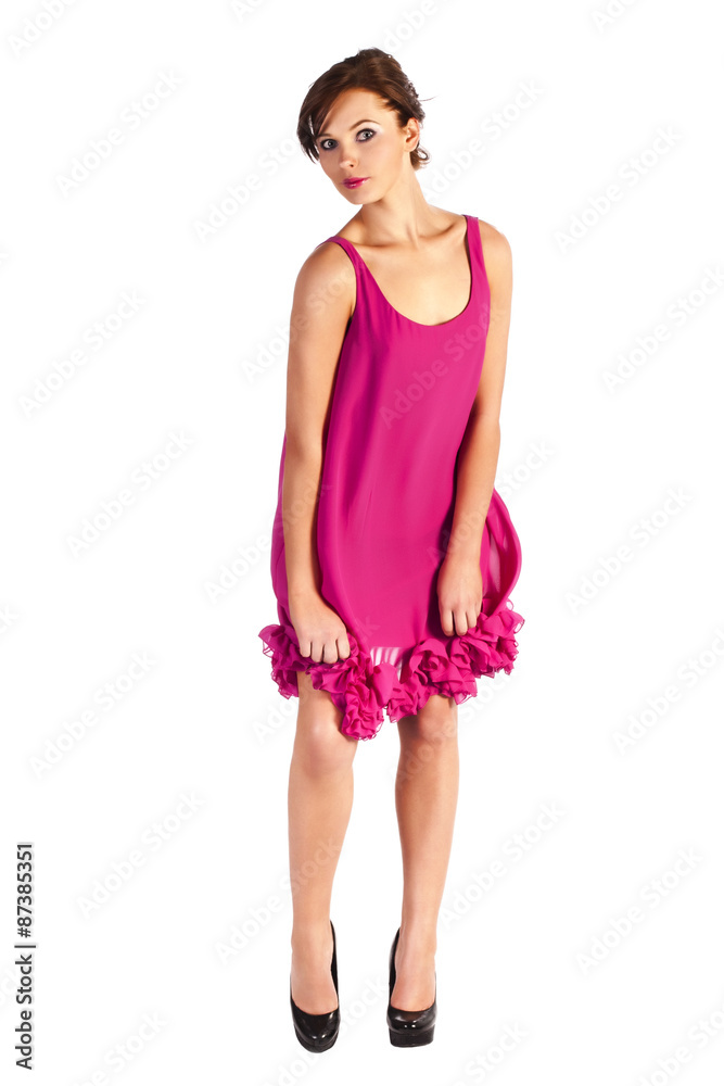 Young and sexy woman model in pink dress posing Young and sexy woman model in pink dress posing