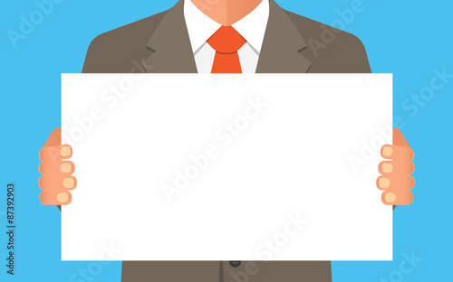 man holding blank banner