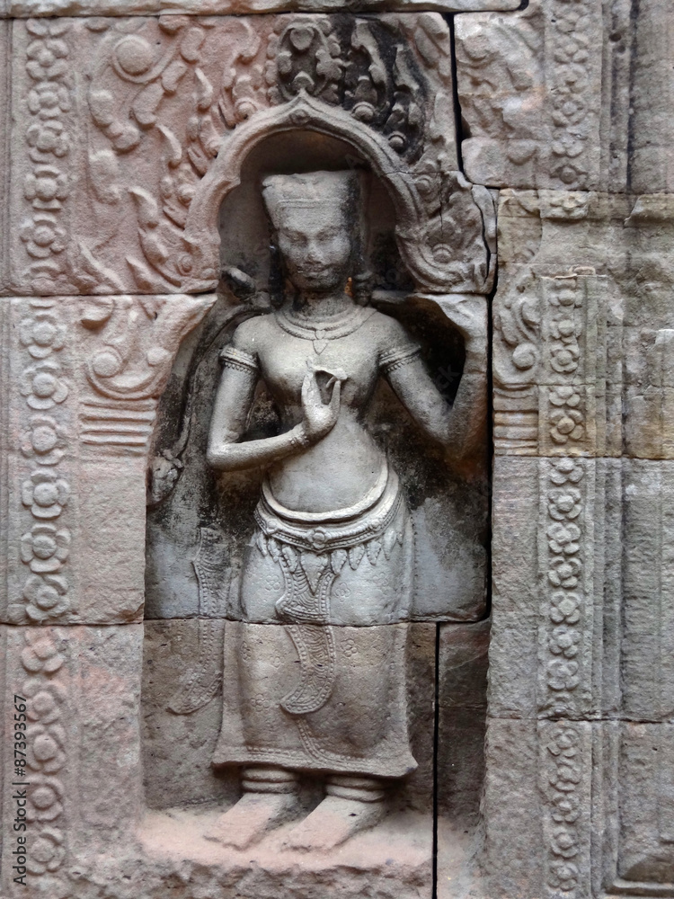 Danseuse (apsara), déesse sur un mur des temples d'Angkor Danseuse (apsara), déesse sur un mur des temples d'Angkor