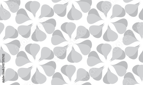 Vector seamless background of teardrop-shaped patterns on a white background. An abstract pattern. © newrossosh