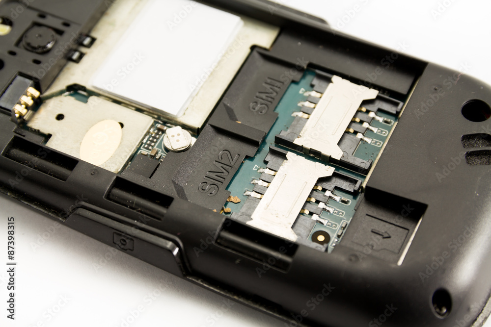 cell phone and two sim cards, close up cell phone and two sim cards, close up