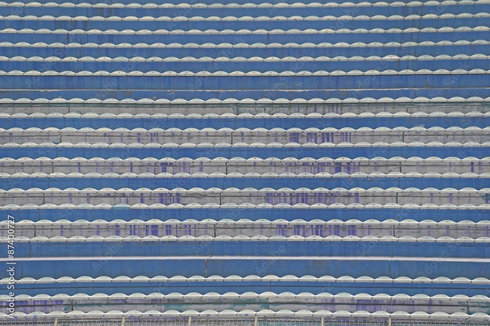 Fototapeta premium empty stands and bleachers without people at stadium