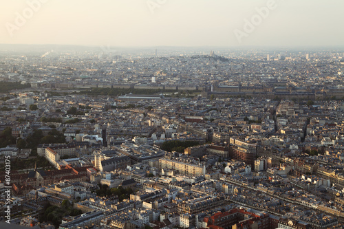 Summer evening view on Paris city from top, France