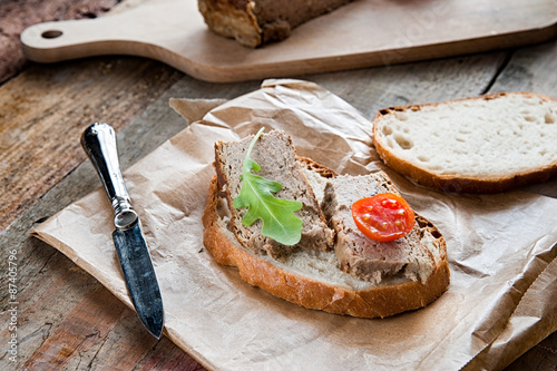 Pork pate with bread and vegetables