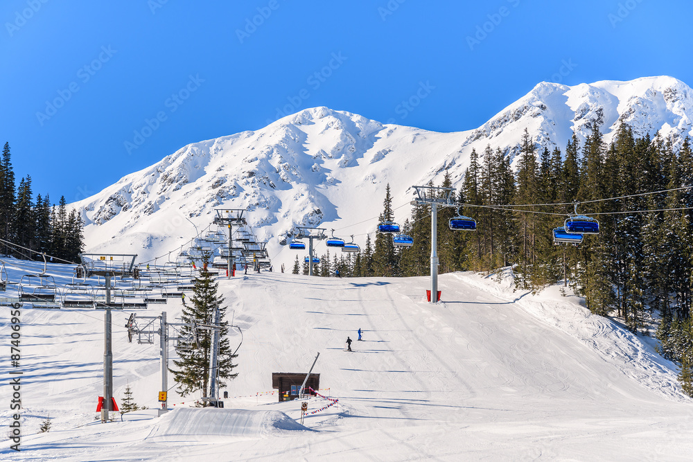 Obraz premium Ski slope in Rohace valley in winter season, Tatra Mountains, Slovakia