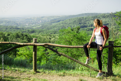 Beautiful hiker woman enjoying the view © NDABCREATIVITY