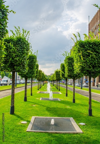 Photography view over green belt stretching through the historical center of budapest on karoly boulevard