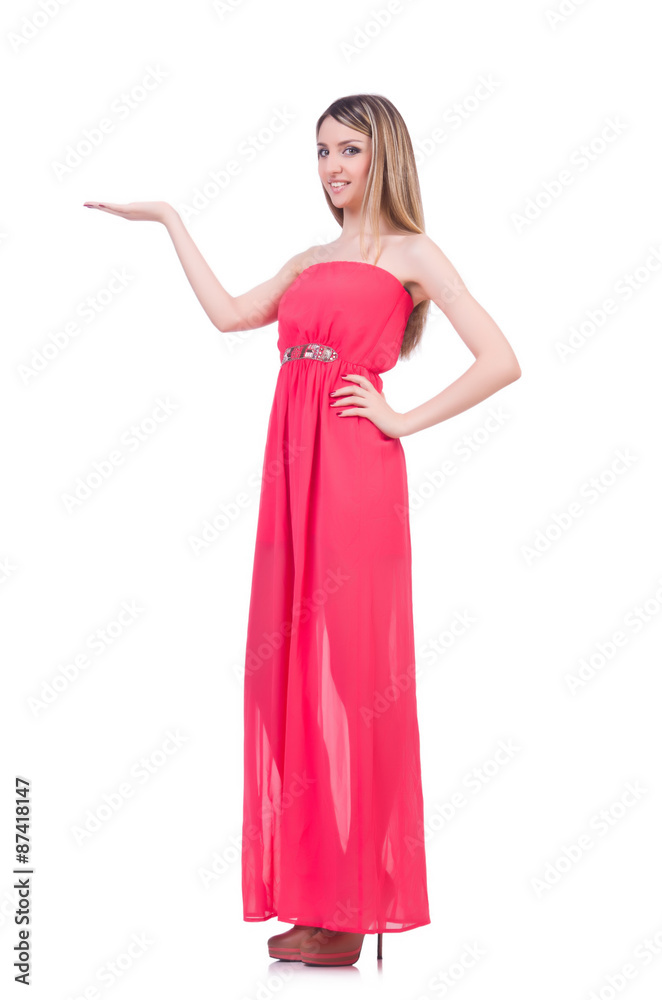 Beautiful girl in pink long dress isolated on white