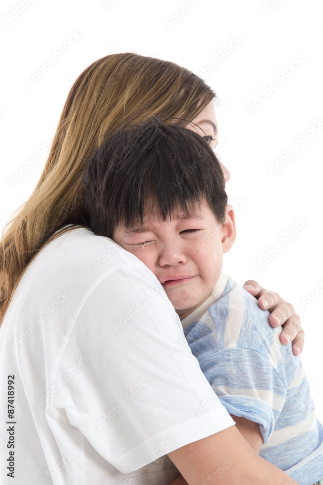 Mother comforting her crying child Mother comforting her crying child