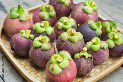 Mangosteen thai fruit on wood background