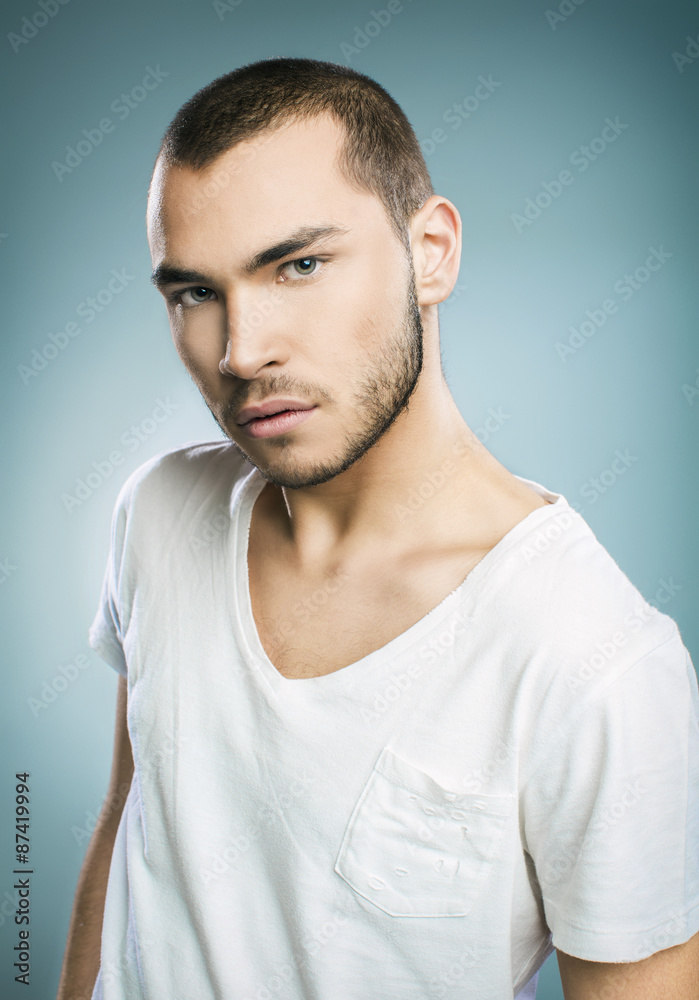 Handsome young man in white t-shirt Handsome young man in white t-shirt