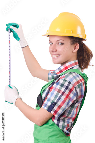 Female workman in green overalls isolated on white